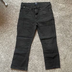 Black crop jeans slightly faded.